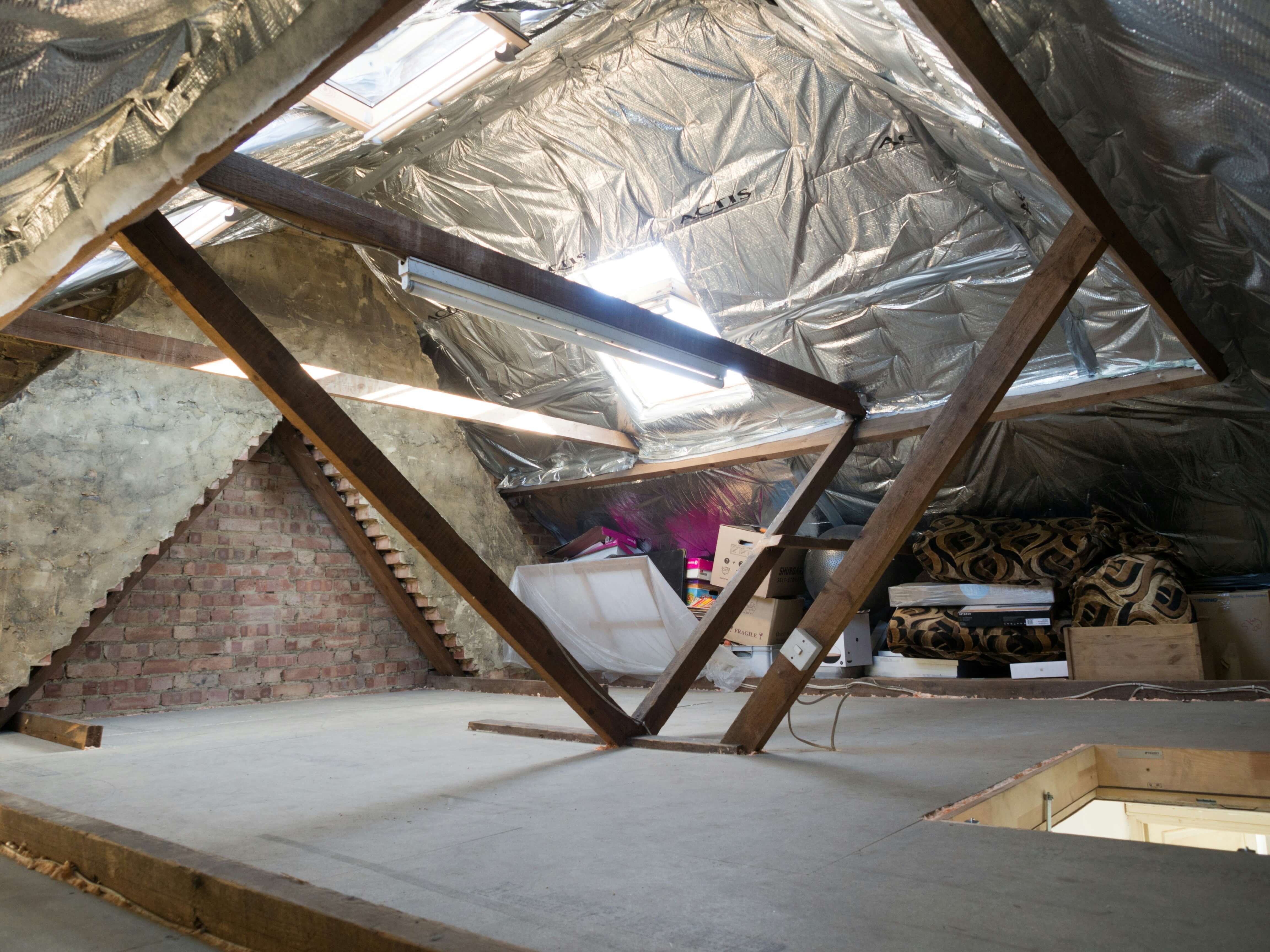 Loft insulation being installed